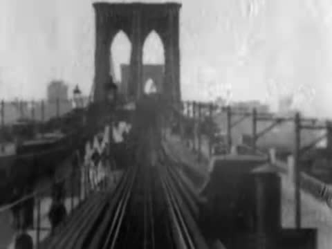 Crossing the Brooklyn Bridge by Train, Brooklyn Bridge, New York, USA