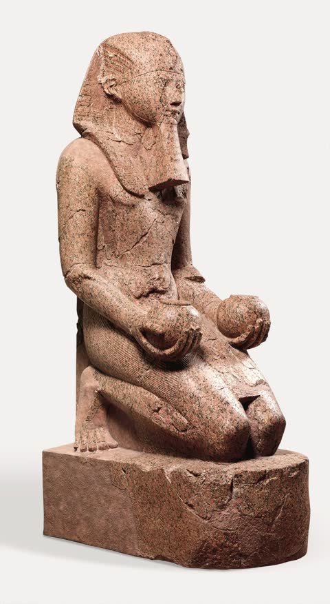 Hatshepsut kneeling with offering jars, Deir el-Bahri, Egypt