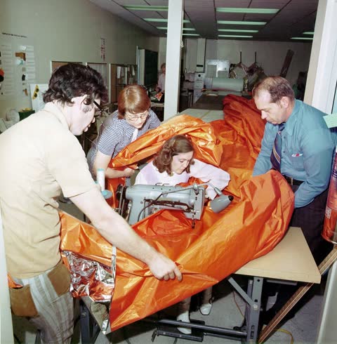Sewing a sunshade for Skylab, Houston, Texas